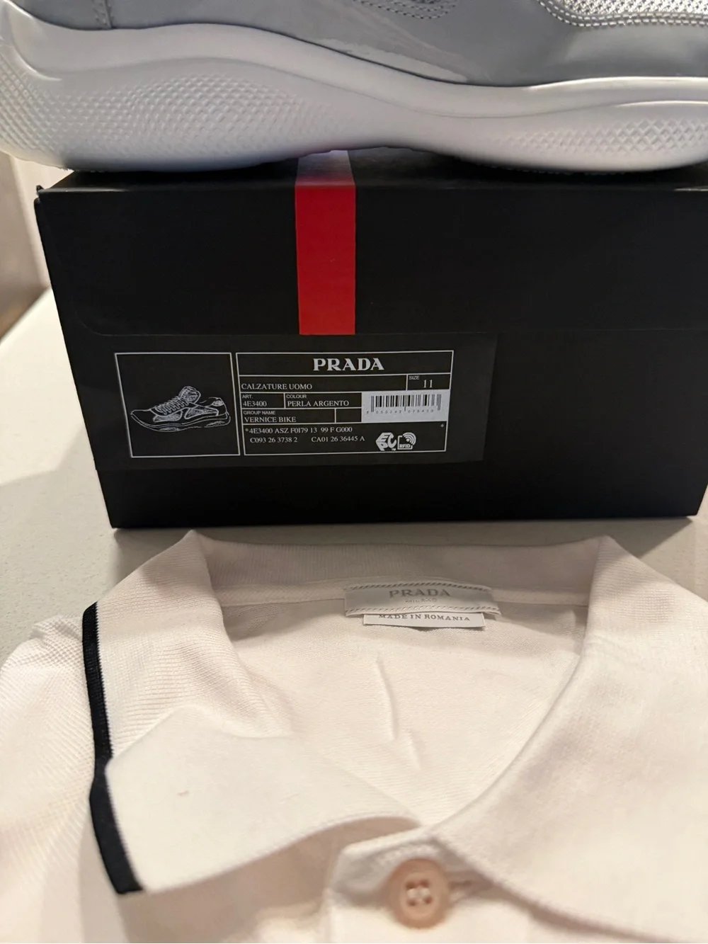 Prada Men’s Light Gray and White Lace-Up Sneakers with Red Logo Tape